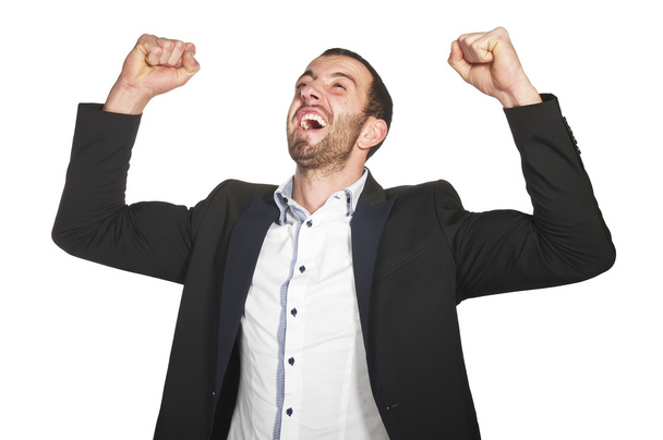 Young businessman celebrates win - Zdjęcie, obraz