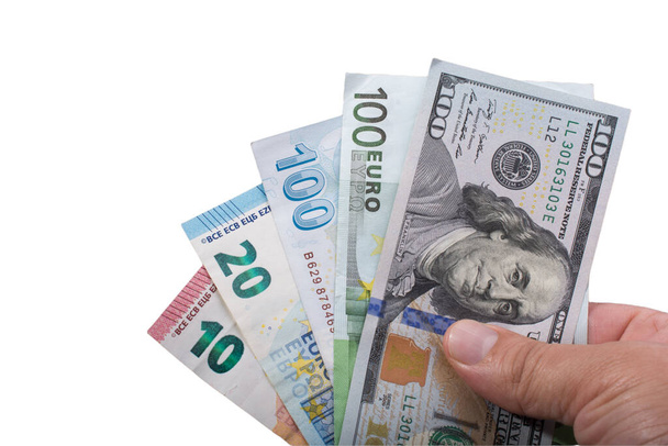 Національна валюта США. Гроші з різних країн: долари, євро. Євро, долар, банкноти ізольовані на білому фоні. Готівка. Концепція фінансів - Фото, зображення