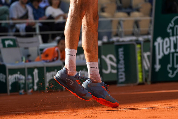 PARIS, FRANCE - JUNE 1, 2022: Grand Slam Champion Marin Cilic of Croatia wears Head tennis shoes during his quarter-final match against  Andrey Rublev of Russia at 2022 Roland Garros in Paris, France - Foto, afbeelding