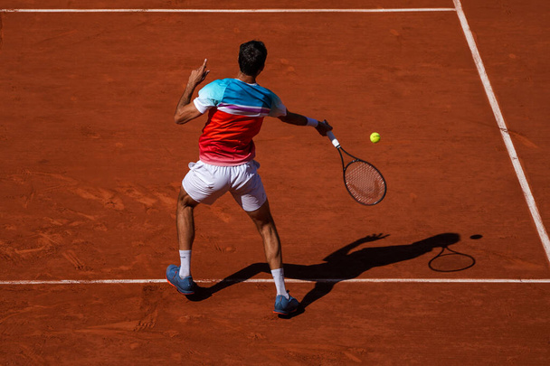 PARIS, FRANCE - JUNE 1, 2022: Grand Slam Champion Marin Cilic of Croatia in action during his quarter-final match against Andrey Rublev of Russia at 2022 Roland Garros in Paris, France - Фото, изображение