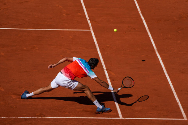 PARIS, FRANCE - JUNE 1, 2022: Grand Slam Champion Marin Cilic of Croatia in action during his quarter-final match against Andrey Rublev of Russia at 2022 Roland Garros in Paris, France - Photo, Image