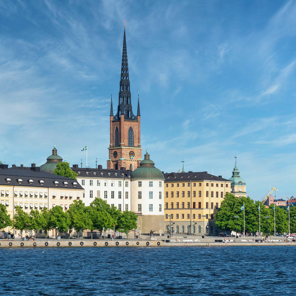View from City Hall overlooking Riddarholmshamnen Island, with Supreme Administrative Court, and Riddarholmen Church tower, Stockholm, Sweden - Foto, Bild