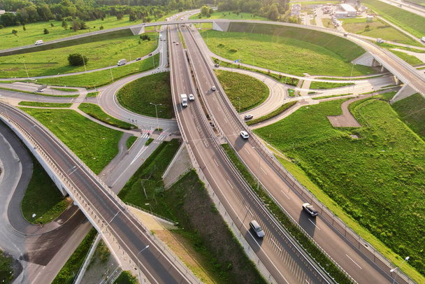 Aerial view of cars driving on round intersection in city, Transportation roundabout infrastructure, Highway road junction in Wroclaw, Poland - Foto, Imagen