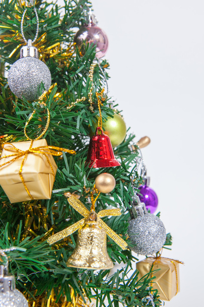 Decorated Christmas tree on white paper background - Φωτογραφία, εικόνα