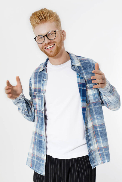 Champion, life winner concept. Young successful entrepreneur with Strong ambitions, passion be number one. Handsome man with redhead, red beard in stylish glasses. White shirt. Copy space. Hairstyle - Zdjęcie, obraz