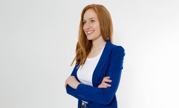 Happy red haired business woman in template blank white t shirt and stylish jacket isolated on gray background. Self career and job consulting knowledge. Young ceo entrepreneur and casual clothes. - Foto, Imagem