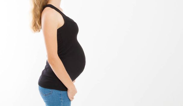 Profile portrait of blonde caucasian woman with pregnant belly isolated on white background . Pregnancy concept. Copy space. Cropped image. Banner - Foto, immagini