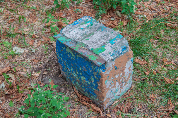 Old reinforced concrete post, used as a support for a bench - Fotografie, Obrázek