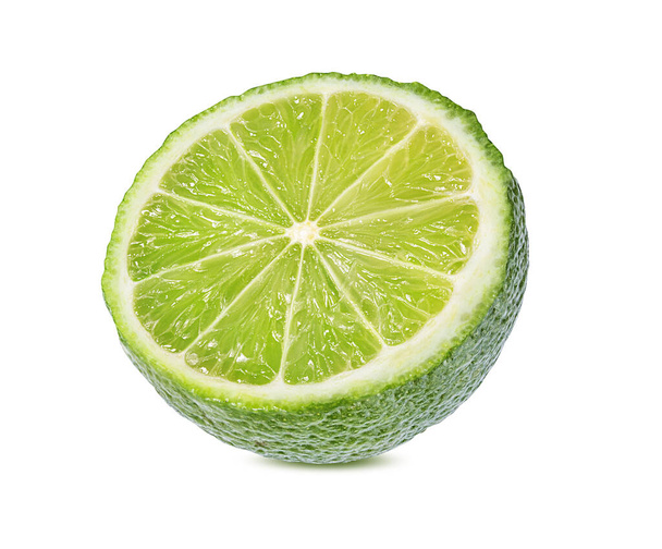 Friss zöld lime izolált fehér alapon. Citrusfélék és trópusi gyümölcsök - Fotó, kép