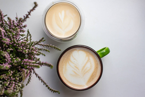 latte art in a cup. handmade brew coffee. morning vives - Photo, image