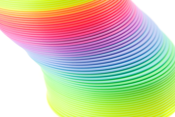 Colorful toy spring isolated on white - Valokuva, kuva