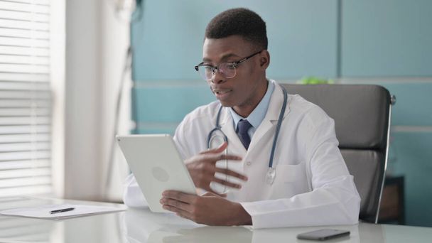 African Doctor making Video Call on Tablet in Office - Photo, Image