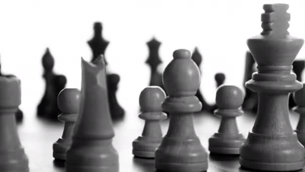 Close up of chess board spinning in black and white - Záběry, video