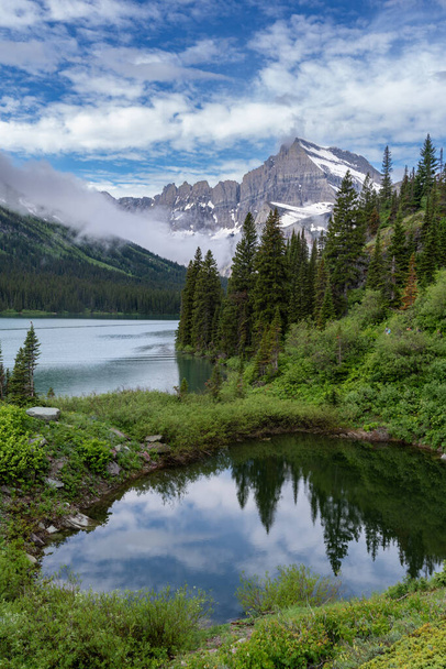 Lake Josephine along the Grinnell Glacier Trail in Glacier National Park Montana USA - Photo, Image