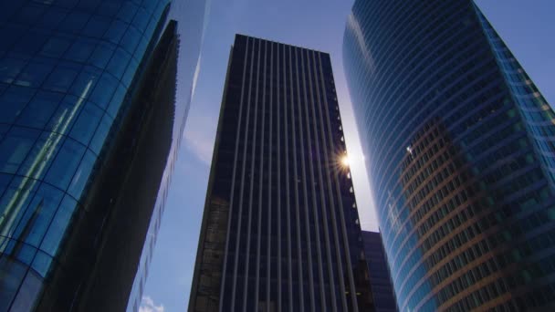 Business district building with blue sky and sun flare, France. High quality 4k footage - Metraje, vídeo