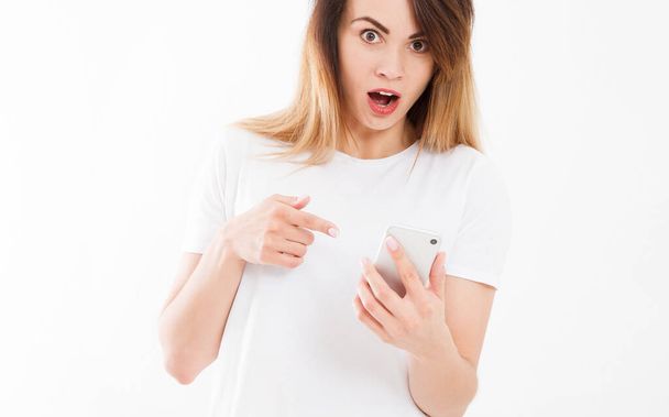 shocked look at phone, cropped portrait surprised young woman looking at smartphone seeing bad news or photos with stunned emotion on face open mouth,copy space - Photo, Image