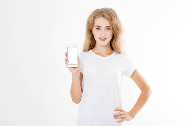 girl, woman in t-shirt holding blank screen mobile phone isolated on white background. Arm hold smartphone, copy space - Foto, Imagen