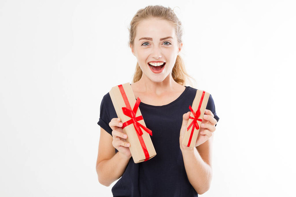 Young pretty woman portrait hold stack of gift boxes. Smiling happy girl in t-shirt on white background. Holiday, summer,discounts concept. Copy space, blank, mock up. - Foto, imagen