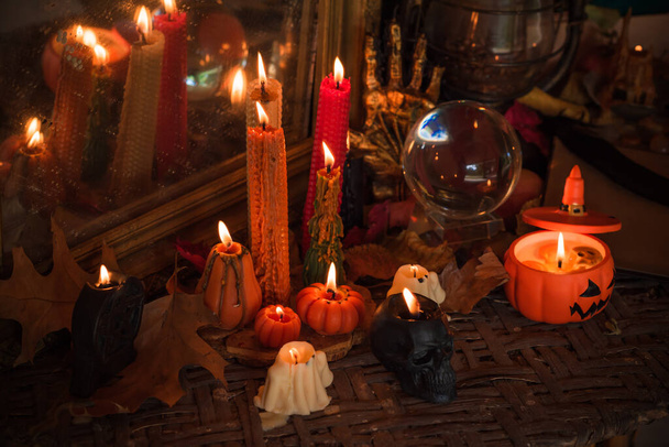 Halloween composition pumpkin orange candles, mystical design for home, interesting ideas for party, details of dcor - Fotó, kép