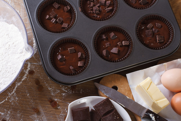 preparation of chocolate muffins closeup top view horizontal - Photo, Image