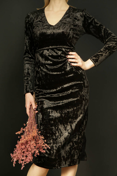 Serie of studio photos of young female model in black textured velvet  dress, autumn fashion collection. - Foto, Bild