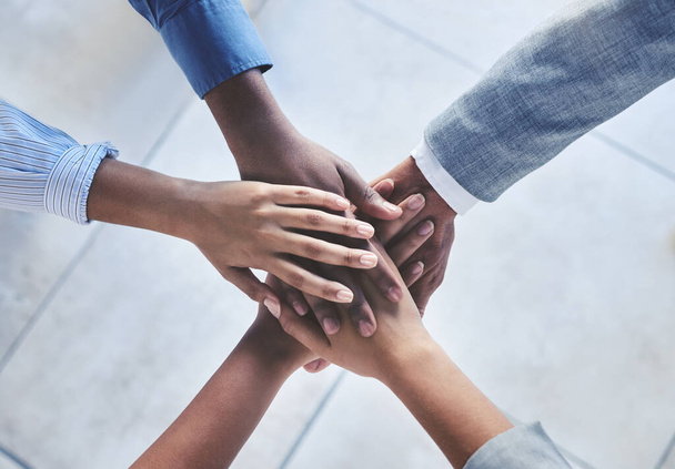 Diversity, partnership and global hands stack of men and women in a company. Team building, support and business people in collaboration using teamwork to set, mission, vision and sale goals top view. - Foto, Imagem