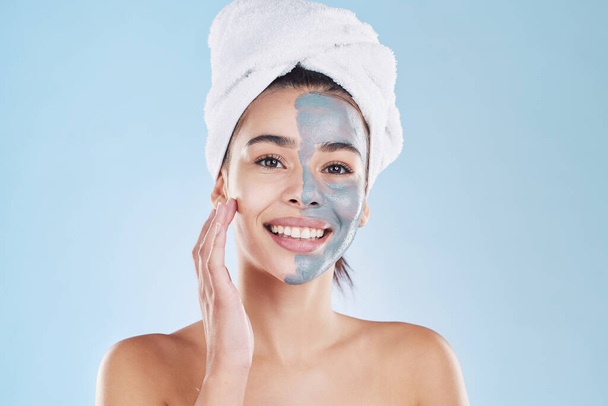 Beauty, skincare product and face mask with a portrait of a beautiful woman taking care of her clean, healthy and happy skin. Smile, charcoal or clay exfoliate during routine hygiene treatment. - Φωτογραφία, εικόνα