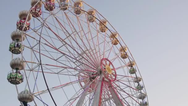 Ferris Wheel at Sunset Light in Amusement Park Footage. - Кадры, видео