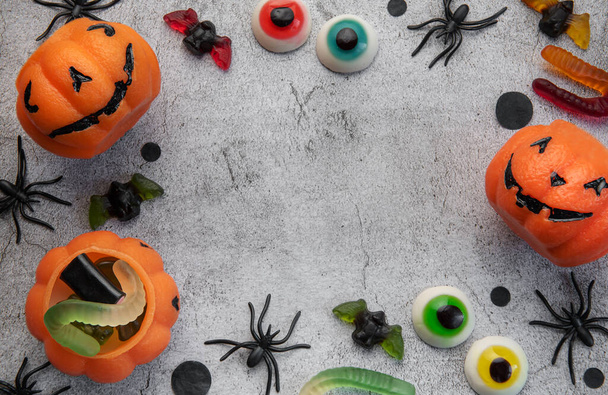 Halloween holiday background with  decorations. View from above. Flat lay - Фото, изображение