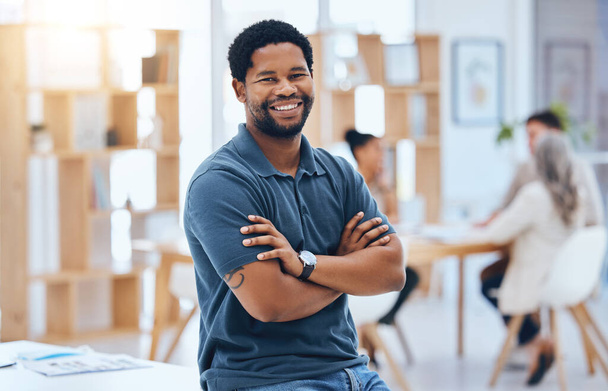 Business meeting, black man and smile portrait with arms crossed at coworking conference desk. Casual corporate male with proud, confident and happy expression at office building boardroom - Photo, Image