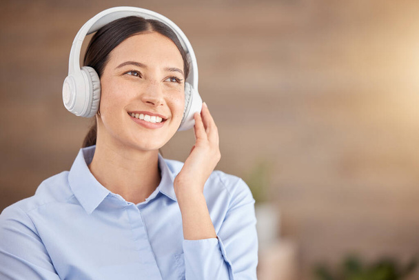Headphone, happy girl and music or podcast online streaming to relax at work, office or startup company. Business woman, employee listening to relaxing song or audio books for stress while on break. - Photo, image