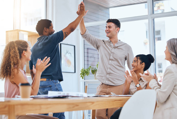 Business people giving high five for success in meeting, people clapping hands for team achievement and in celebration of company win. Excited, growth and support in partnership at work office. - Φωτογραφία, εικόνα