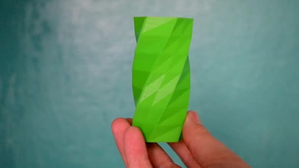The person holds on his hands and view green object created on 3d printer. POV, point of view, mtb. Fused deposition modeling, FDM. Progressive modern 3D printing additive technology. 4ht revolution. - Footage, Video