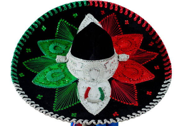 Mexican charro hat on serape. Typical mexican hat with the colors of the mexican flag. - Valokuva, kuva