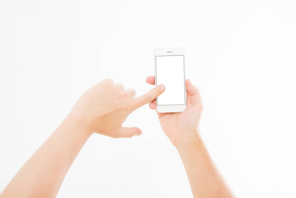 Hand hält weißes Telefon isoliert auf weißem Clipping-Pfad im Inneren. Top view.Mock up.Copy space.Template.Blank. - Foto, Bild