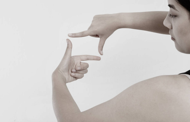 Female hands framing comosition. Isolated on white background. Copy space. Mock up. - Valokuva, kuva