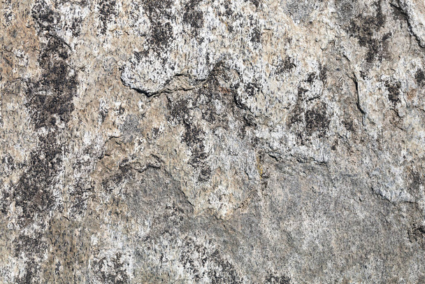 Rough stone texture. Stone facade detail of a house. Hard and rough material - Foto, afbeelding