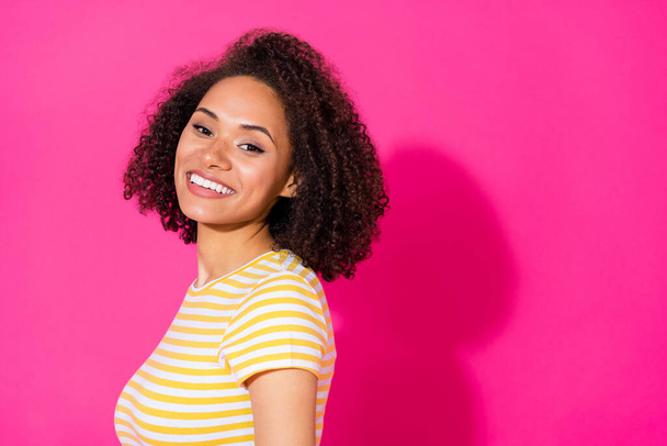 Photo of young attractive pretty nice girl wear striped t-shirt look you toothy girlish lovely empty space information isolated on pink color background. - Photo, Image