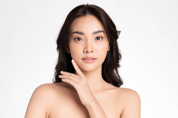 Beautiful young asian woman with clean fresh skin on white background, Face care, Facial treatment, Cosmetology, beauty and spa, Asian women portrait. - Zdjęcie, obraz