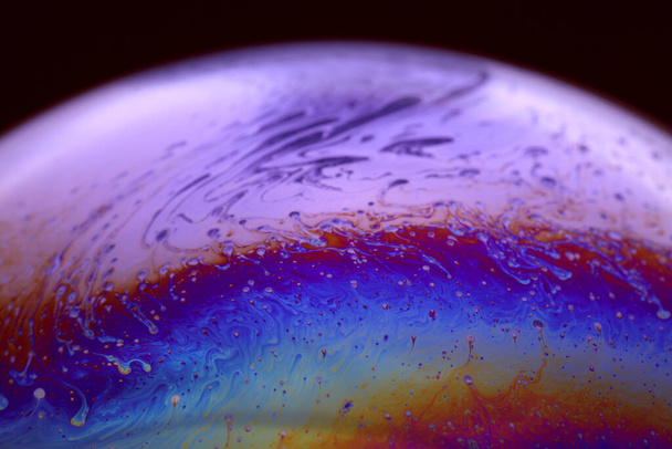 The abstact element on the soap bubble with the dark background. - Fotoğraf, Görsel