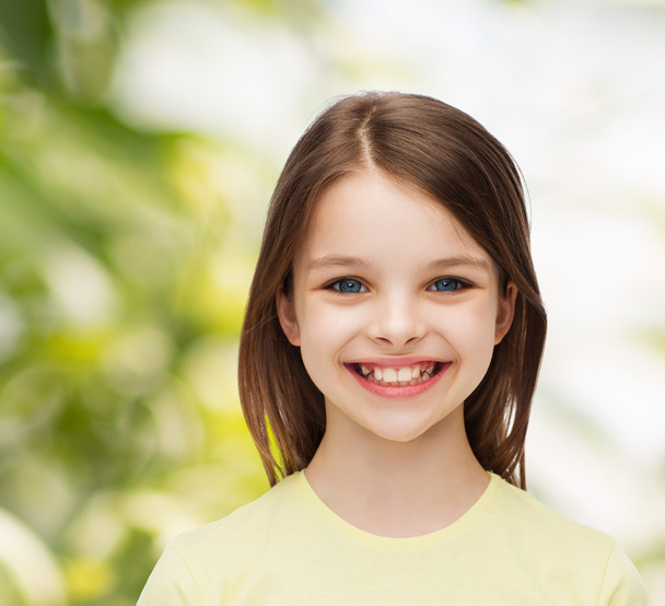 smiling little girl over white background - 写真・画像