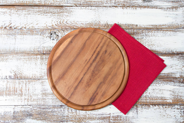 desk and red napkin on wooden table,mock up,template - Foto, Imagen