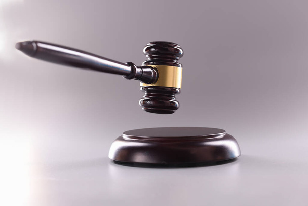 Wooden gavel for court or auction on gray background.Symbol of power and the right to perform competent actions in position of judge - Foto, Imagem