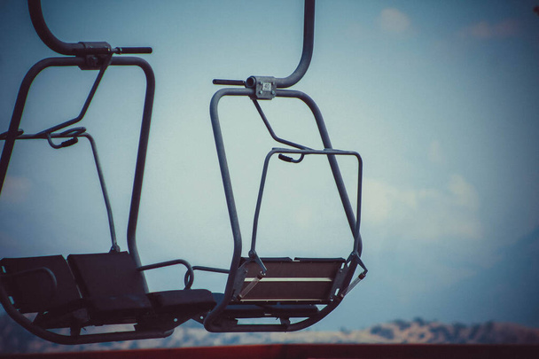 Cable car system reaching Babadag Mountain from the Dead Sea coast, free seats, selective focus - Fotoğraf, Görsel