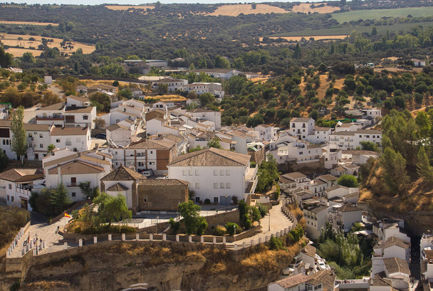 SETENIL DE LAS BODEGAS, CADIZ, SPAIN, SEPTEMBER, 5, 2022: Views of the village of Setenil in Andalucia,Spain,famous for being one of the most beautiful villages in Spain and for its famous cave houses - Fotoğraf, Görsel
