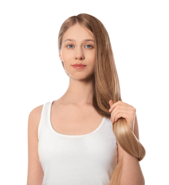 Teenage girl with strong healthy hair on white background - Zdjęcie, obraz