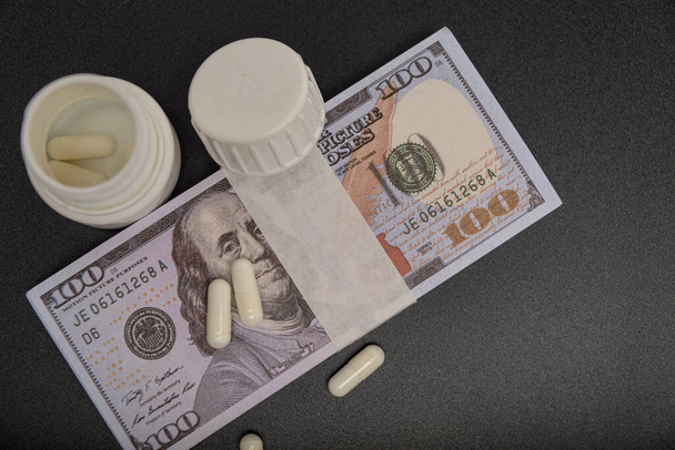 Medical business or prices concept. Making money in pharmaceutical industry or high medical expenses. Also drug dealing, dealer or trade - Photo, Image