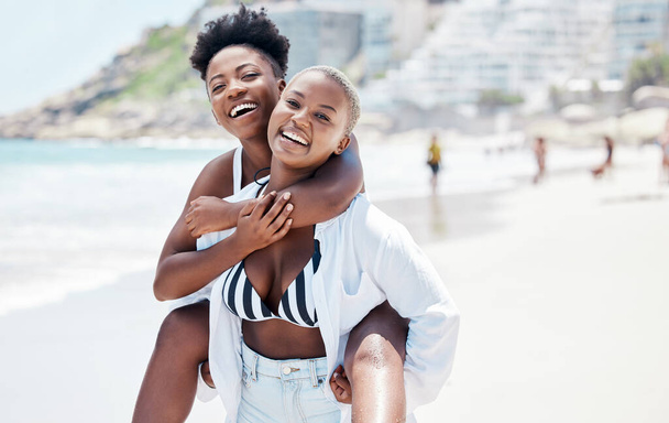 Beach, black woman and fun friends carrying by sea, ocean water or nature background on summer break in Miami, Florida. Portrait of smile, happy women and comic people in freedom and bikini on travel. - Foto, Bild