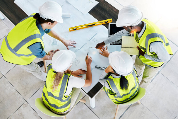 Engineer, architect or construction team workers working on creative innovation, planning and strategy design plan for building. Teamwork, meeting and industrial architecture business model idea. - Foto, immagini