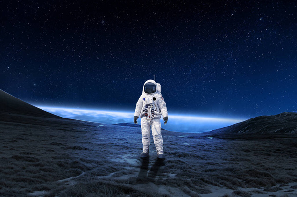 3D Astronaut on rock surface with space background ,astronaut walk on the moon wear cosmosuit. future concept - Photo, image